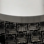 visualization of a spent nuclear fuel dry storage cask showing sealed canister, fuel basket, overpack, passive air cooling paths and closure lids.